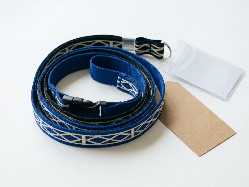Woven custom lanyards coiled with breakaway clasp and ID badge holder